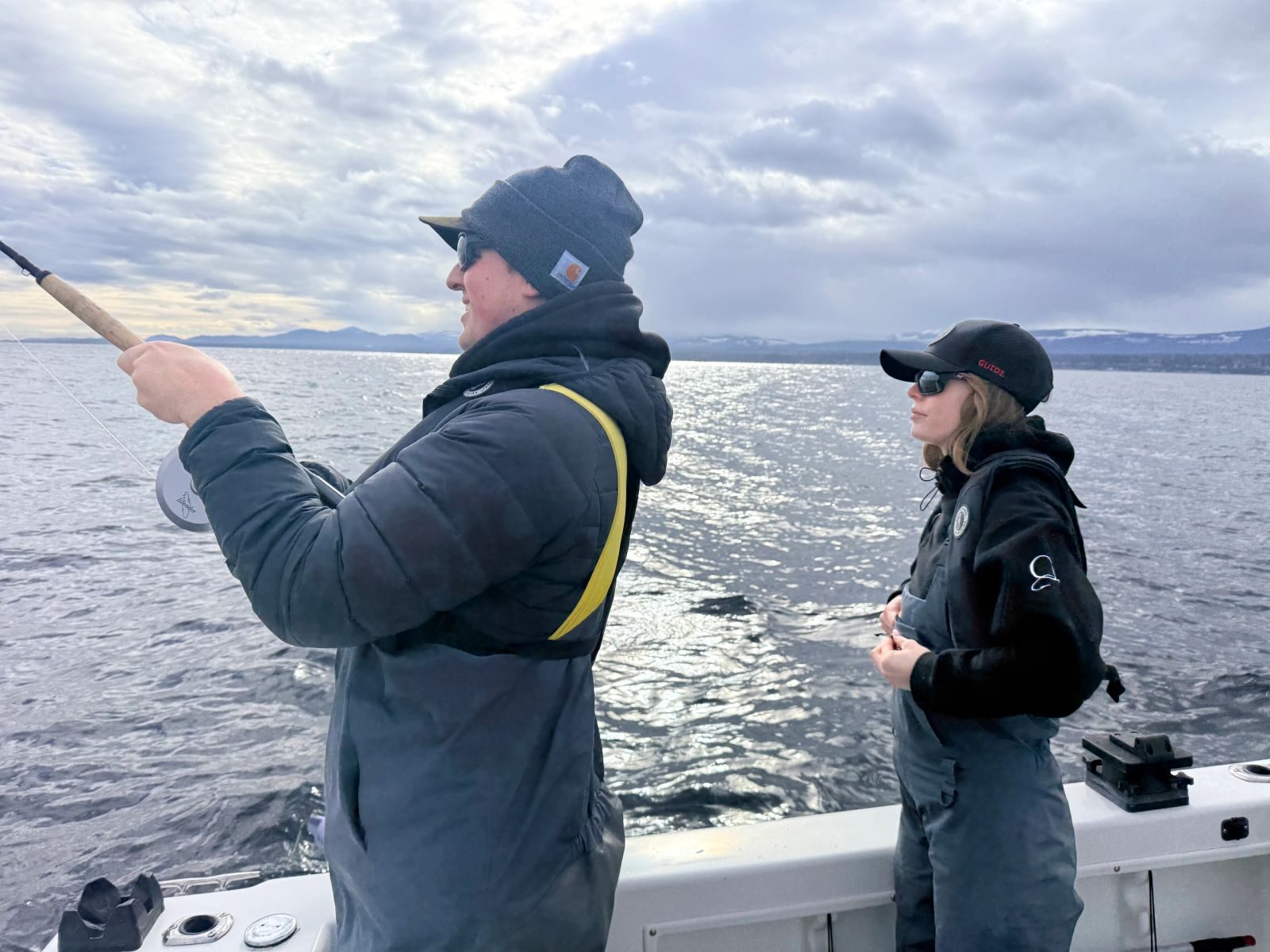 Anglers fishing from the stern of the charter boat